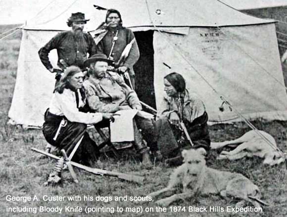George A. Custer with scouts and dogs